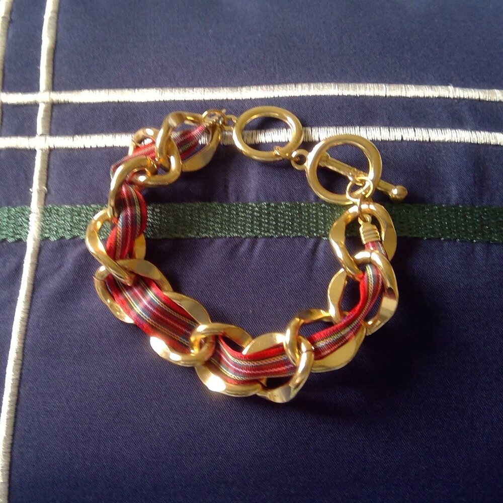 Gold tone chain bracelet with red tartan ribbon Aldo brand
